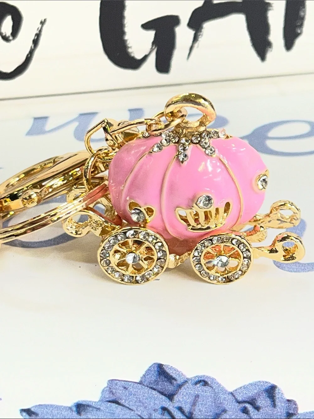 Pink Braided Strap Keychain with Gold Carriage Charm